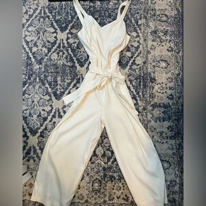 White linen belted jumpsuit from the limited